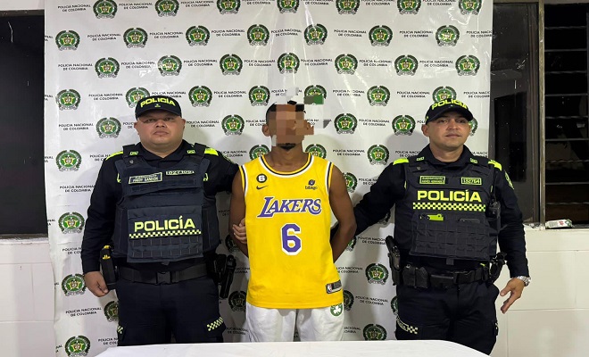 Policia y capturado