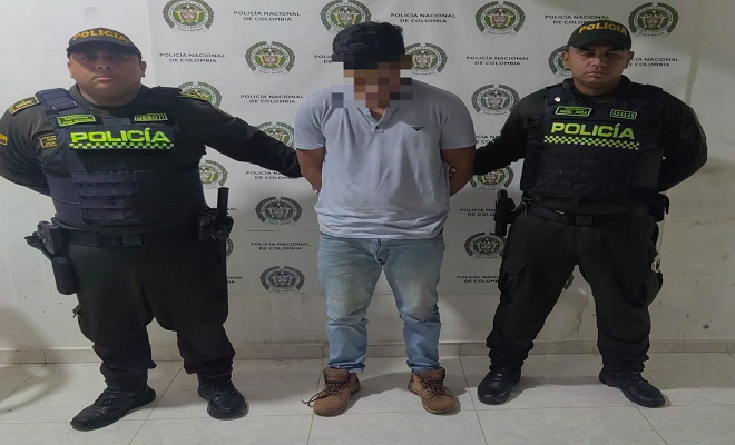 Policía y capturado