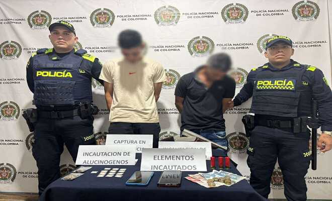 Dos polic&iacute;as junto con dos capturados, arma de fuego y estupefacientes incautados